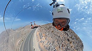 Adrenaline-junkies take on the world's longest zipline