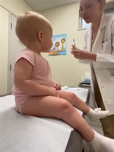 Emotional Moment: Doctor Encourages Baby for Injection