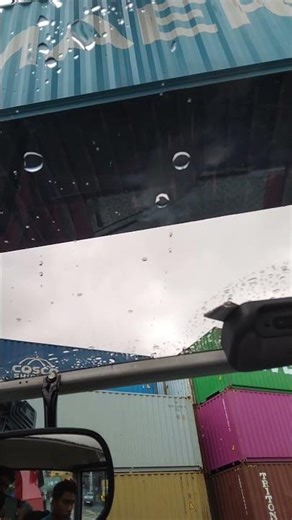 Kalmar Reach stacker with a tilting spreader for container handling