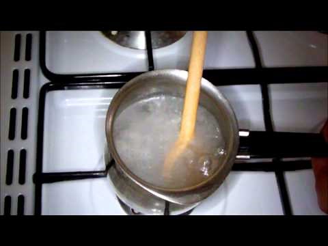 Cleaning a silver coin with vinegar: "how"