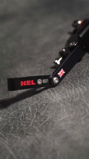 🏍️ Elevate Your Ride with the HEL Performance Thumb Brake – The Ultimate Control Upgrade! 🙌 Our Thumb Brake is a masterpiece of engineering, fully CNC machined from premium 6082 aluminum and available in hard anodized grey or black finishes. 💨✨ What sets it apart? The multi-position lever, allowing you to find your ideal comfort zone. Need more reach? Extend it effortlessly to meet your needs, all while enjoying minimal interference thanks to the pressed-in bearings. 🛠️👌 Every major part is