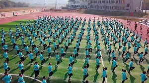 A 57-year-old teacher creates fitness exercises to encourage more of students' enthusiasm for sports at a school in China's Changsha. | China Xinhua News