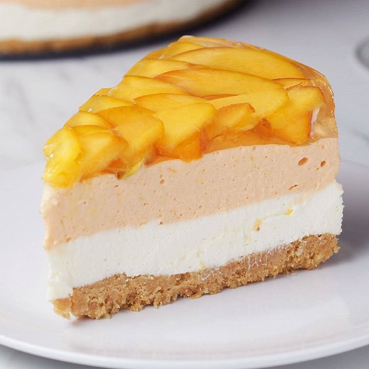 17M views · 157K reactions | Feeling peachy ? Layer up and cool down with this peaches n' cream cheesecake. Get the recipe: https://tasty.co/recipe/peaches-n-cream-cheesecake | Tasty | Facebook
