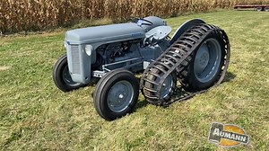 Here's something you don't normally see on a Ferguson tractor. This tractor is fitted with aftermarket Bombardier rubber half tracks. Bombardier was one of a few companies that built aftermarket half-tracks for Ferguson and Ford tractors. These tracks provide great traction in soft ground or snow. #ford #fordson #ferguson #massey #classictractor #classictractorfever #farm #farmer #farming #farmlfie | Classic Tractor Fever