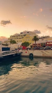 There's just something about Front Street during golden hour ✨ After you spend the afternoon hitting up the local shops, restaurants and museums in the City of Hamilton, book a boat cruise from Hamilton Harbour and get lost in the coastal view. Ready to book your evening on the water? https://bit.ly/405BW2z 🎥 IG: cansu_ig | #GoToBermuda #LostYetFound | Bermuda Tourism