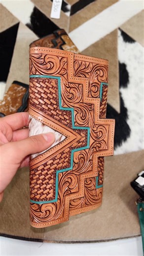 Discover unique tooled leather and cowhide wallets that blend style and durability. Perfect for everyday use or as a thoughtful gift. Shop now! Western-linens.com | Western Linens