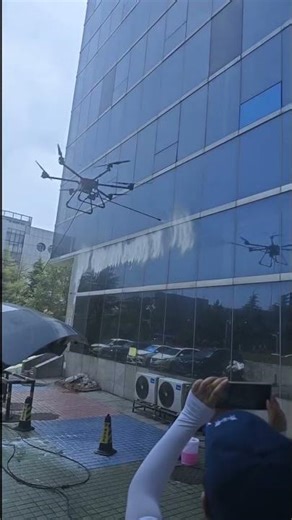 Cleaning Drone Adjustable Camera For Clear High Rise Glass Curtain Wall Cleaning Situation Check