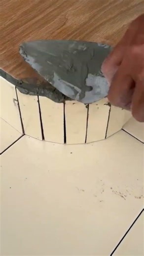 the process of installing small tiles on the floor easily #construction #tiles #floor #shorts