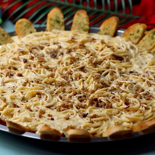 This Creamy Bacon Spaghetti is served in an oozing whole wheel of Brie…😲🧀 | Twisted