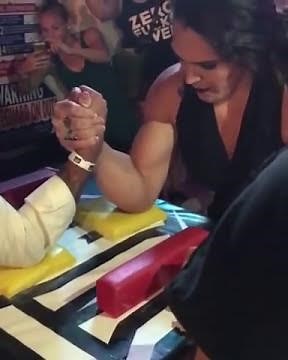 Mma fighter Gabi Garcia beats man arm wrestling