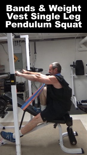 Nick Nilsson on Instagram: "Single Leg Pendulum Squat loading...this is an alternative loading method to holding a dumbbell or kettlebell in your hand. The "base" exercise here (the single leg pendulum squat done using an incline bench and a bar set in the power rack) has been one of my most popular exercises. It's VERY effective and once you get the setup, it's actually pretty quick to get set up. One of the primary questions has been "how do you load this heavy enough to build strength while o