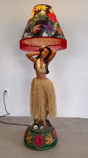 MERIT on Instagram: "Mechanical Hula Girl Floor Lamp, 1970s Hawaii Resin floor lamp of a Hula girl. Original shade. Original straw skirt. Hand painted. Mechanical hips that sway operated by an on/off switch. Hand switch on the socket operates the led lightbulb. Large 52” version. In very good condition with little to no wear. Unusual size. Perfect for a beach house, or bar. Available now. Visit our website or send us a DM to learn more. #vintagelamp #vintagelighting"