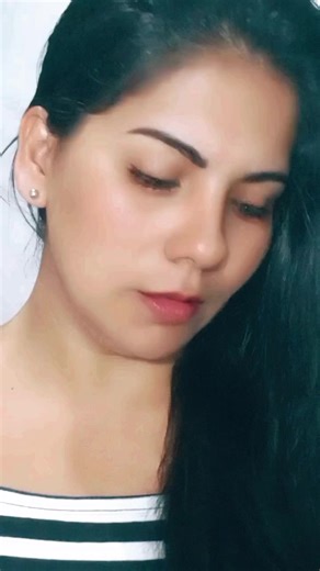 Close-Up View of Neck and Chest in Striped Garment