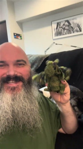 I crocheted a cute little dragon, I think?