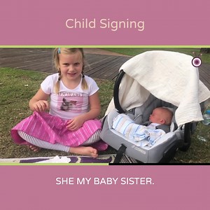 This little girl, a child of deaf parents, proudly shows you her baby sister, using sign language. | Auslan Online