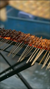 66K views · 518 reactions | Satay Java, Indonesia  ⭐️4.4 Discover Java: www.tasteatlas.com/java Satay is a traditional Indonesian dish consisting of skewered meat that's served with a sauce on the side. All types of meat can be used to make satay, even some exotic varieties such as crocodile or snake meat. Marinades vary, but typically include dark soy sauce, sugar, garlic, lime juice, and other seasonings. Video: @wonderfulindonesia | TasteAtlas | Facebook