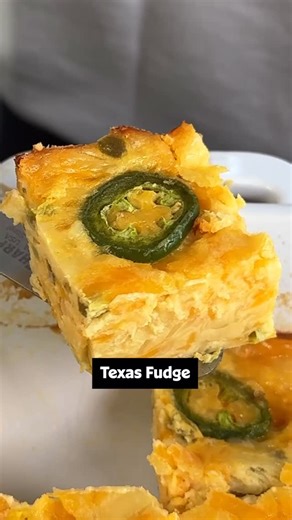 Allrecipes on Instagram: "This ultra-creamy Jalapeño Texas Fudge layers sharp cheeses with tangy pickled jalapeños for a baked bite full of Texas-style flavor. 🔥🤠 They’re simple to mix, quick to bake, and impossible to resist. Keep reading or click the link in the @allrecipes bio for full recipe! 🌶️ Ingredients: 2 large eggs 1 can evaporated milk 1/2 cup all-purpose flour 1/2 teaspoon garlic powder 1/2 teaspoon onion powder 1/4 teaspoon kosher salt 8 ounces sharp Cheddar cheese, shredded 8 ou
