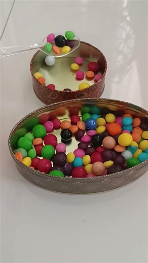 transfering skittles using plastic spoon #asmr