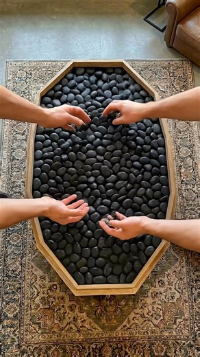 Thinking of trying this for my living room! The combination of black river rocks and epoxy is just perfect. Would you put this in your | kenenus