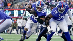 Saquon Barkely plunges ahead for his first TD of game