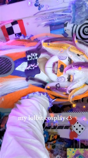 ⛈️🦋♡lulu♡🦋⛈️ on Instagram: "I HOPE YALL LOVE IT AS MUCH AS I DO!!! . . #lolbit #lolbitcosplay #fnaf #fnafcosplay #sisterlocation #accesorizedcosplayer #cosplay #cosplayer #makeup #wig #mainecosplayer #stormylilaccos"