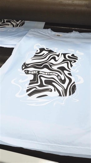 Psst: don’t overthink it 💭 Custom t-shirt printing is made easy at the T-Shirt Co. unlimited colours, no MOQ, and a super fast turnaround. Printed for Chandii Yamba. #tshirtco #tshirtoftheday #tshirtprinting #tshirtdesigns #printedtshirts