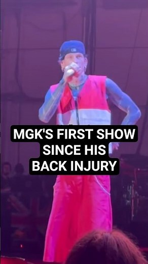 mgk's 1st show since back injury: "Against all of the doctor's wills, we're here." But he's hurting😭