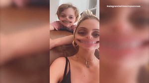 Ashlee Simpsons flaunts growing baby belly playing with kids