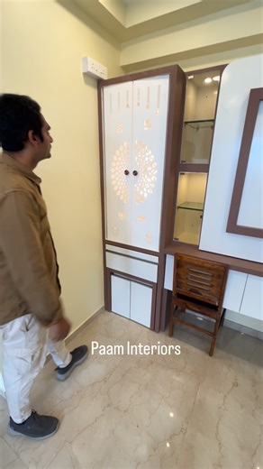 Modern mandir design that brings peace and Prosperity Where God Ram meets his devotees Would you choose this mandir for your home? _ [home mandir design, modern pooja room, temple interior, luxury mandir, wooden mandir, minimalist mandir, spiritual home decor, poojaroomideas,Vastumandir,Indianhometemple] . . #mandirdesign #poojaroom #homedecorinspo #mandirunit | Paam Construction