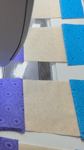 Elevate your dining space with a stunning table runner! Step 18. SEW SIDE 3 and 4 ✨ This step-by-step tutorial guides you through creating an exquisite piece that adds elegance to any occasion. Want to craft one yourself? Stay tuned for our upcoming in-depth tutorial! JOIN our PREMIUM CLUB 🧵 ✨ Explore more at: Square in a Square Teaching Website http://www.squareinasquare.net Shop at Square in a Square http://www.squareinasquare.com Ask a Question https://www.squareinasquare.com/pages/contact-u