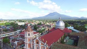 Colonial 16th century Spanish built of Saint Paul the First Hermit Cathedral also known as San Pablo Cathedral, built at the center of the city, showing the tower and dome. drone aerial