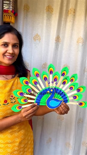 Colours Creativity Space on Instagram: "Peacock craft / Easy Peacock wall Decor DIY / Peacock Wall Art / Peacock Craft / Peacock diy from cardboard and popsicles or icecream sticks #peacockcraft #wallhanging #peacock #craft #icecreamstickcraft #popsiclesticks #cardboardcrafts #papercraft #kidscraft #schoolcraft #easydiy #bestoutofwaste #homedecor #wallart #walldecor #romanticmarathinovel #viral #diypeacock"