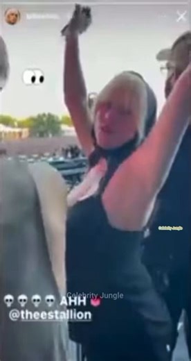 Billie Eilish hands in the air overly bouncing TITS.😳👀