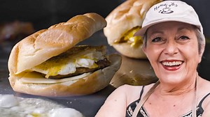 5.6M views · 62K reactions | Mama Jo has been serving breakfast staples like bacon, egg, and cheese sandwiches, omelets and traditional Greek pastries, such as spanakopita and baklava, from her food truck in Midtown Manhattan for over 35 years. | Munchies | Facebook