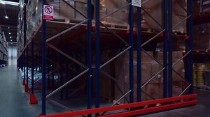 Huge boxes in the warehouse. Creative. Sealed boxes in a huge large warehouse where things are stored.