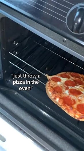 Pizza Slips from Tongs and Falls on Oven