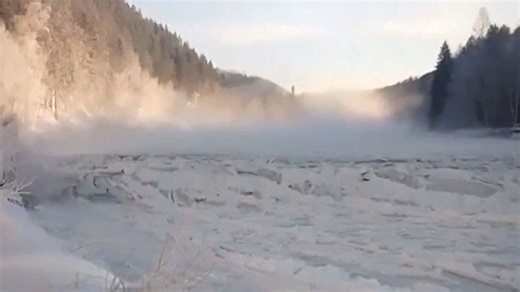'Ice tsunami' surges through frozen river in Russia