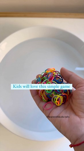 SAVE this idea for the weekend or summer days. Comment “BANDS” for a link to these colorful bands. Setup this fun and simple activity for your child. Throw in some bands in water and give a stick or fork to fish for the bands. Make it challenging by picking more than the previous turn. Follow @learnwithkidscrafts for easy ideas #simpleactivities #playbasedlearning #toddleractivities #finemotorskills #handeyecoordination #preschool #kindergarten #iteach #simpleplay #finemotoractivities #montessor