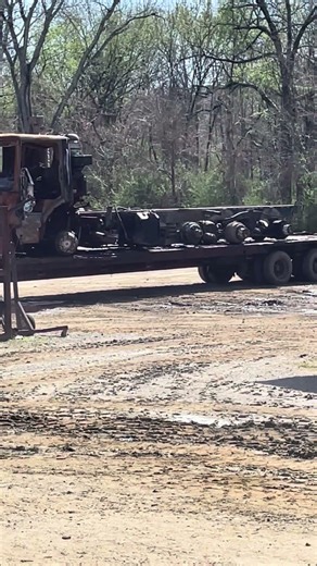 Burnt Up Garbage Truck Getting Loaded Up for Scrap Metal