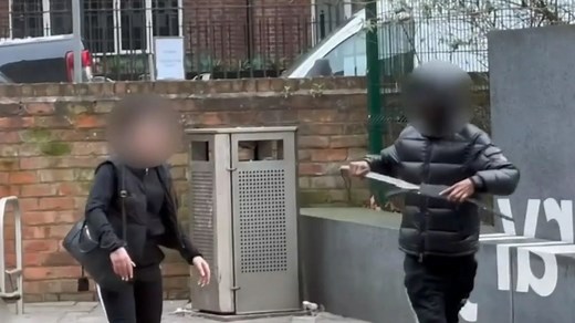 Terrifying moment gang pulls out huge machetes during standoff in city centre