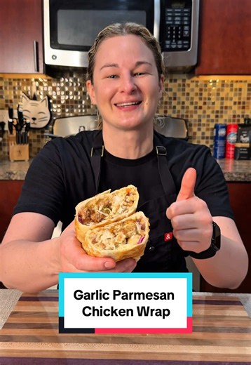 High Protein Garlic Parmesan Wrap Recipe makes 1 serving Macros: 388 calories 43g protein 38g carbs 19g fat Ingredients 1 Mission carb balance burrito wrap 4 oz Real Good Chicken Nuggets 1 cup coleslaw salad mix 2 tbsp bacon bits 1 tbsp Parmesan cheese 2 tbsp Sweet Baby Ray’s garlic Parmesan sauce #highprotein #highproteinrecipes #mealprep #easyrecipes #chickenwrap