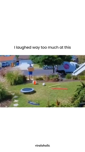 VIRAL VIDEOS on Instagram: "This video captures a hilarious 15-second backyard fail featuring a man in a bright blue outfit attempting to show off his agility, captioned "I laughed way too much at this" to signal the comedic disaster about to unfold. Carrying a large cardboard box, he confidently approaches a mini-trampoline in his yard, but the moment he jumps, the frame of the trampoline collapses completely, sending him tumbling into the grass. The audio is layered with high-pitched, wheezing