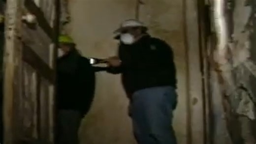 'Help us get rid of this': Town leaders call for demolition of destroyed hotel in 2002 video