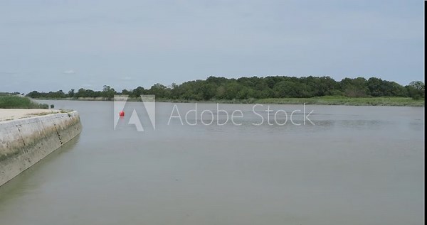 The Charente river in Charente-maritime in southwestern France between the naval base of Rochefort and the Charente estuary