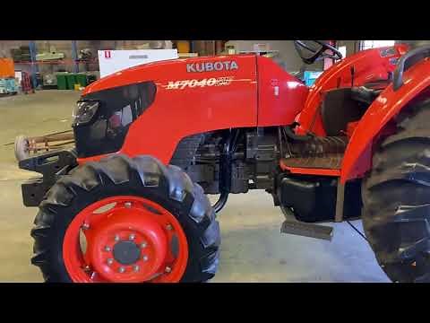 KUBOTA M7040SU 70 HP TRACTOR , AS NEW CONDITION , 386 HOURS T/T , 2014 MODEL ,4 WD .