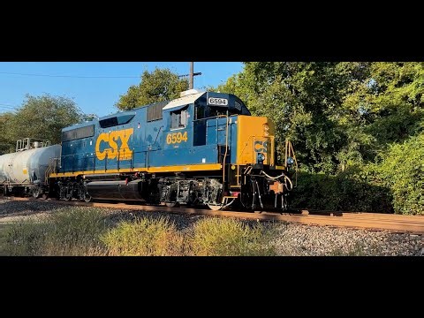 Two Places, CSX and NS Trains Roar By