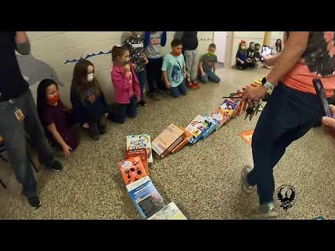 Domino run of donated cereal boxes from Upstate NY elementary kids