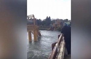 Freight train plunges into river after bridge collapse in Chile