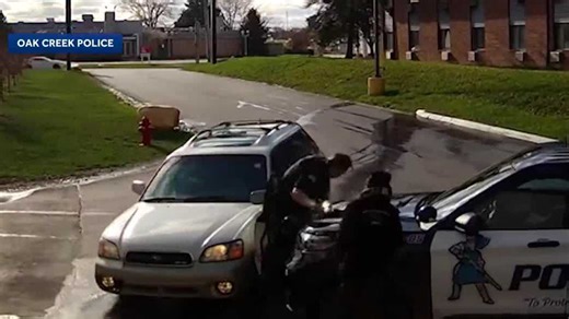 Video: Driver hits Oak Creek police officer outside Red Roof Inn