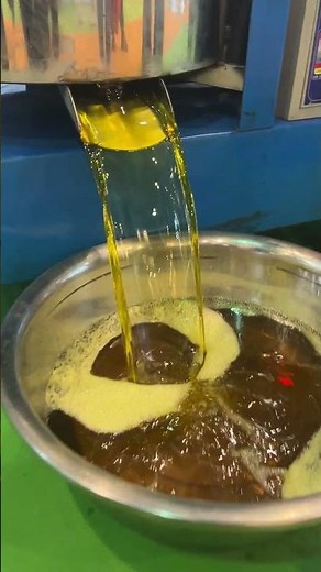 oil press machine with oil filter to press mustard oil. sunflower seeds oil. peanut oil. oil making.